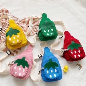 Close-up of strawberry canvas chest bags for kids in five vibrant assorted colors