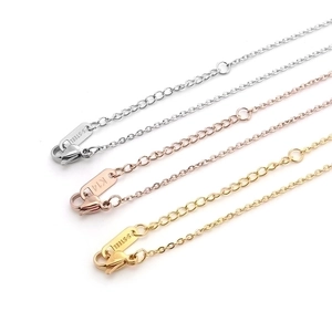 Three-color stainless steel necklaces in silver, rose gold, and gold with lobster clasps