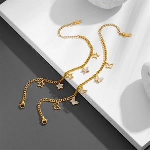 Gold titanium steel bracelet with butterfly and star charms featuring white shell inlay