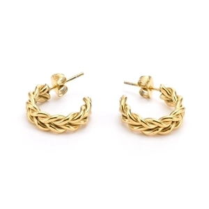 Detailed view of chunky golden double twist braided hoop earrings with polished metal finish