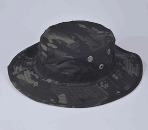 Detail view of tactical boonie hat with breathable metal mesh vents and dark camo pattern