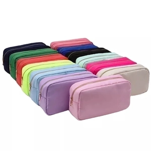 Large capacity waterproof nylon cosmetic bags in various colors displayed on white background