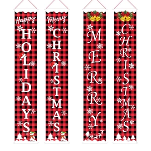 Close-up of red and black buffalo plaid Christmas porch banners with holiday greetings