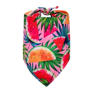 Detailed view of pink pet bandana with summer watermelon and palm leaf print