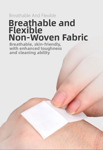 Detail of soft non-woven alcohol prep pad applied to skin showing breathable texture
