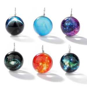 Set of six glowing solar system glass ball pendants with cosmic nebula galaxy designs