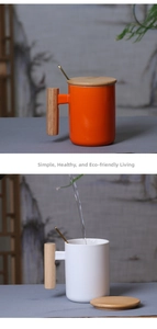 Detail of Nordic ceramic mug with wooden handle and lid including a gold metal spoon