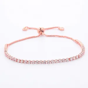 Bracelet tennis classique en or rose avec zircons ronds et fermoir à glissière ajustable