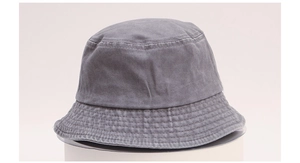 Close-up of grey washed cotton bucket hat showing detailed fabric texture and stitching