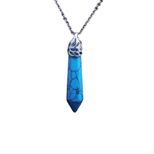 Detail of blue hexagonal crystal pillar pendant on a silver-tone chain necklace