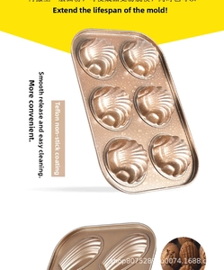 Close-up of non-stick 6-cup Madeleine pan with shell-shaped carbon steel molds