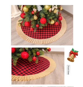 Detailed view of red and black buffalo plaid Christmas tree skirt with ruffled edges
