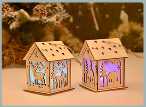 Macro detail of laser-cut wooden Christmas houses with LED lights and reindeer patterns