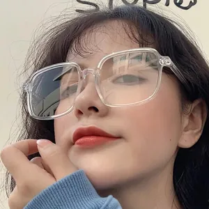 Asian model wearing stylish large transparent anti-radiation glasses with oversized square frame