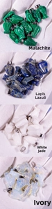 Detail of four natural stone angel pendants in malachite, lapis, white jade and opalite