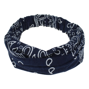 Detail of navy paisley bohemian headband showing elastic back and white floral pattern