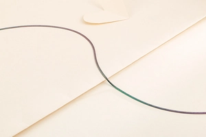 Detail shot of iridescent colorful snake chain necklace for DIY jewelry making