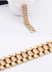 Detail of gold-plated stainless steel link bracelet with sparkling cubic zirconia inlay