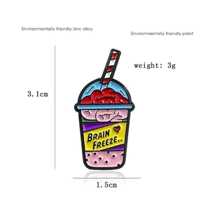 Detailed view of brain freeze drink enamel pin with measurements in centimeters