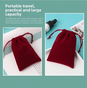 Close-up of burgundy velvet drawstring pouch showing soft texture and dual cord closure