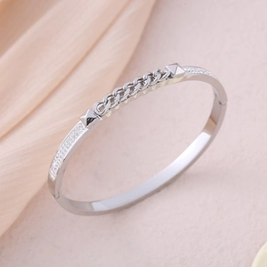 Polished stainless steel cuff bracelet with chain link detail and pavé zircon accents