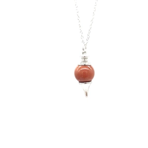 Detailed close-up of brown goldstone sphere pendant with silver metal wrap on chain