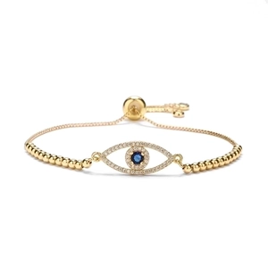 Adjustable golden evil eye bracelet with blue zircon inlay and fan-shaped charm
