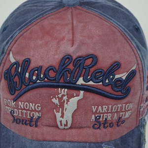 Close-up of vintage washed navy and red baseball cap with BlackRebel 3D embroidery