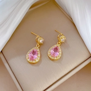 Pink teardrop crystal earrings in gold frame with white micro-pave crystals on silk