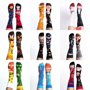 Detailed grid view showing creative cartoon crew socks with diverse themed patterns