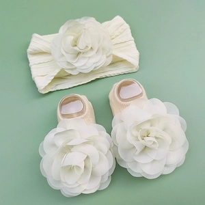 Baby headband and socks set with cream white chiffon flowers on mint green background