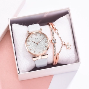 Détails de la montre à quartz Tadi avec bracelet en cuir blanc et bracelet étoile rose