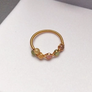 Detail of 14K gold-filled wire-wrapped ring featuring five colorful tourmaline beads