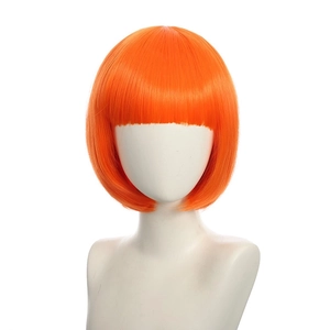 Detail view of a vibrant orange short bob wig with bangs on a professional mannequin