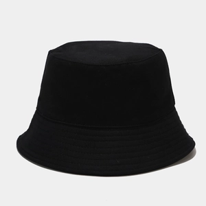 Close-up of black cotton bucket hat featuring reinforced stitched brim and minimalist design