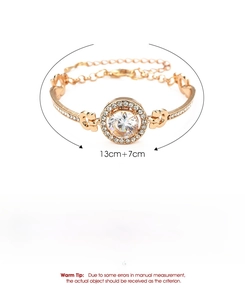 Detail of rose gold zirconia bracelet with heart hollow clasp and size measurements