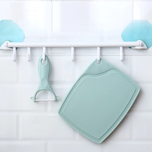 Kitchen knife set with ceramic-style fruit knife, light blue cutting board and peeler