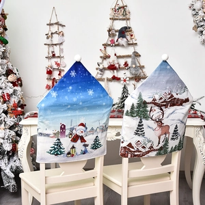 Christmas chair covers featuring cartoon snowman and reindeer prints with plush pom-poms