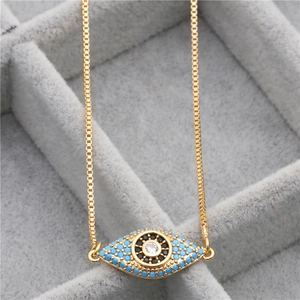 Golden micro-paved zircon evil eye pendant necklace with blue and black details