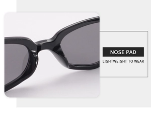 Close-up of integrated nose pads on sleek black polygonal sunglasses for lightweight wear