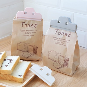 Set mit großen Lebensmittel-Verschlussclips aus Kunststoff in Rosa, Grau und Beige für Brot