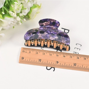Purple floral acrylic hair claw clip with gold metal teeth 9cm length measurement