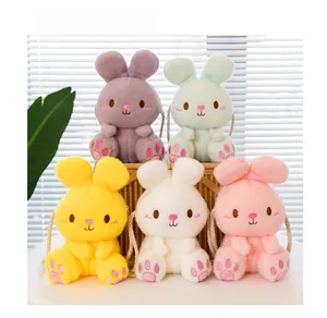 Detail of colorful plush rabbit crossbody bags with soft texture and embroidery