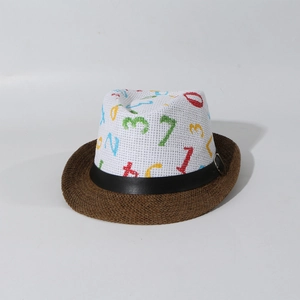Close-up of children's straw fedora with mesh top and colorful number patterns