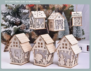Macro detail of wooden Christmas cabin ornament with elk pattern and hanging rope