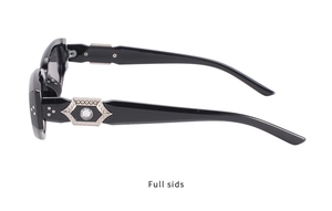 Detail of black sunglasses arm featuring silver diamond metal piece and round crystal stud