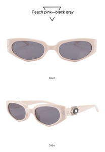 Peach pink cat-eye sunglasses with gray lenses and crystal hexagon side details