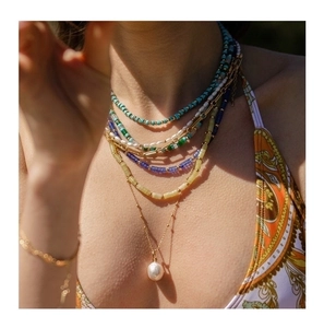 Layered summer necklace set with colorful beads, natural stones and large white pearl
