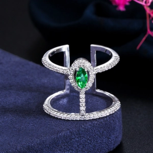 Elegant silver open ring with marquise-cut emerald gemstone and sparkling zircon pave