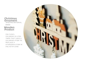 Detail of wooden Christmas door hanger with layered snowman and sequin finish